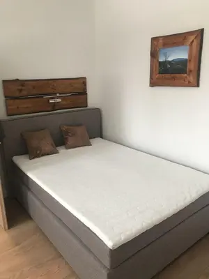 Ein Bett oder Betten in einem Zimmer der Unterkunft Bergsuite NO.27