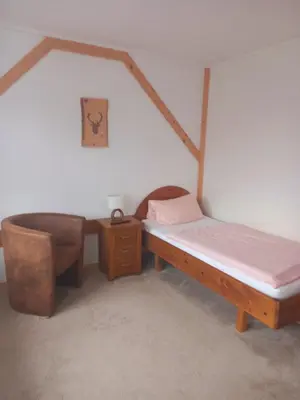 Ein Bett oder Betten in einem Zimmer der Unterkunft Wald-Landhaus