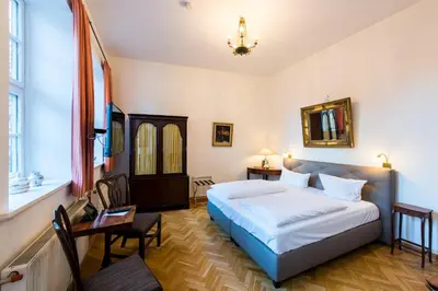 Ein Bett oder Betten in einem Zimmer der Unterkunft Theophano´s Appartements im Kornmarkt