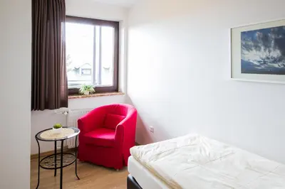 Ein Bett oder Betten in einem Zimmer der Unterkunft Ferienwohnanlage Prinzenhof