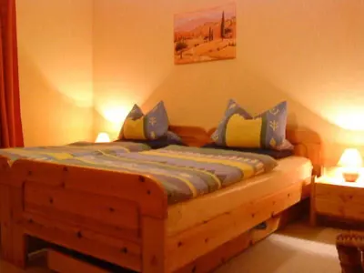 Ein Bett oder Betten in einem Zimmer der Unterkunft Ferienwohnung 