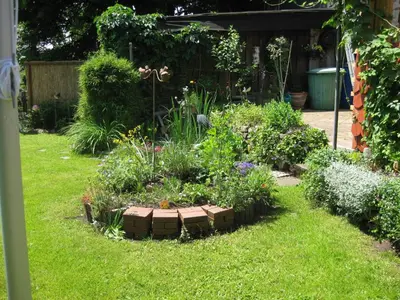Ein Garten an der Unterkunft Ferienwohnung 