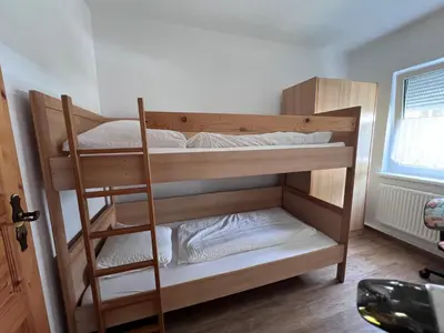 Ein Bett oder Betten in einem Zimmer der Unterkunft Haus Wiesengrund