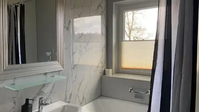 Ein Badezimmer in der Unterkunft Zollhaus 26