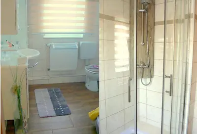 Ein Badezimmer in der Unterkunft Ferienhaus 