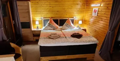 Ein Bett oder Betten in einem Zimmer der Unterkunft Poolhaus im Südharz