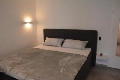 Ein Bett oder Betten in einem Zimmer der Unterkunft Ferienwohnung Ohanna