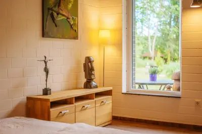 Ein Bett oder Betten in einem Zimmer der Unterkunft Ferienhaus Thale