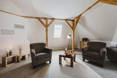 Ein Sitzbereich in der Unterkunft HarzLodge Emma
