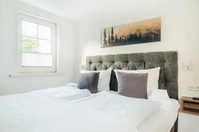 Ein Bett oder Betten in einem Zimmer der Unterkunft Villa Luna Braunlage