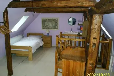 Ein Bett oder Betten in einem Zimmer der Unterkunft Altes Tagelöhnerhaus von 1510 mit Garten und Parkplatz