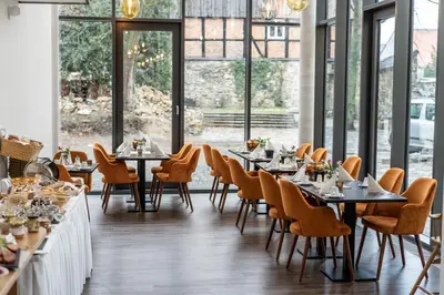 Ein Restaurant oder anderes Speiselokal in der Unterkunft Romantik Hotel Alte Münze