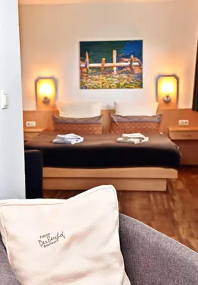 Ein Sitzbereich in der Unterkunft Pension - Der Berghof
