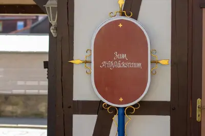 Ein Zertifikat, Auszeichnung, Logo oder anderes Dokument, das in der Unterkunft Gästehaus Schmitz ausgestellt ist