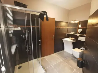 Ein Badezimmer in der Unterkunft Altstadt Pension Orchidee