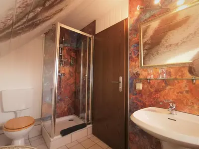 Ein Badezimmer in der Unterkunft Altstadt Pension Orchidee