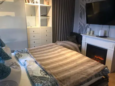 Ein Bett oder Betten in einem Zimmer der Unterkunft FEWO Am Eichenberg