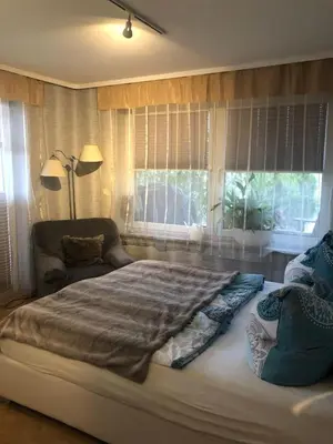 Ein Bett oder Betten in einem Zimmer der Unterkunft FEWO Am Eichenberg