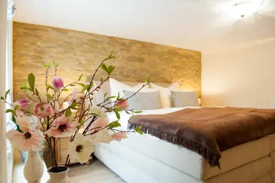 Ein Bett oder Betten in einem Zimmer der Unterkunft Ferienhaus Schlossgarten
