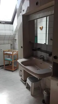 Ein Badezimmer in der Unterkunft Ferienwohnung Kück-Rathausstrasse