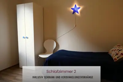 Ein Bett oder Betten in einem Zimmer der Unterkunft Haus Asgard FeWo perfect für Familien mit Kleinkinder und Hund, zentral gelegen im Harz