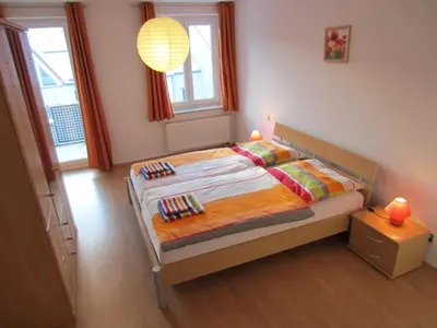 Ein Bett oder Betten in einem Zimmer der Unterkunft Brockenapartments