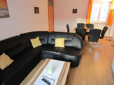 Ein Sitzbereich in der Unterkunft Brockenapartments