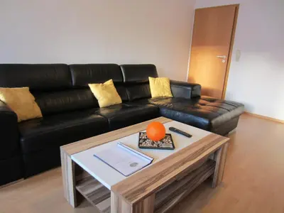 Ein Sitzbereich in der Unterkunft Brockenapartments