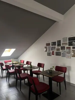 Ein Sitzbereich in der Unterkunft Hotel zur Radau