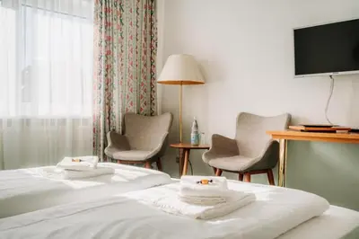 Ein Bett oder Betten in einem Zimmer der Unterkunft Hotel zur Radau