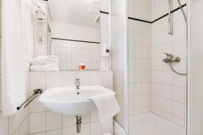 Ein Badezimmer in der Unterkunft Hotel zur Radau