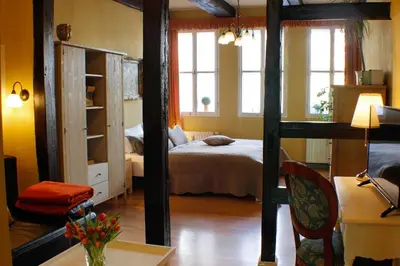 Ein Bett oder Betten in einem Zimmer der Unterkunft Ferienwohnungen-Stobenstraße-de