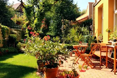 Ein Garten an der Unterkunft Ferienwohnungen-Stobenstraße-de