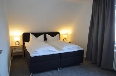 Ein Bett oder Betten in einem Zimmer der Unterkunft Haus Siggi