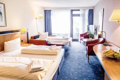 Ein Bett oder Betten in einem Zimmer der Unterkunft Apartment Seeblick am Bocksberg - Hahnenklee 