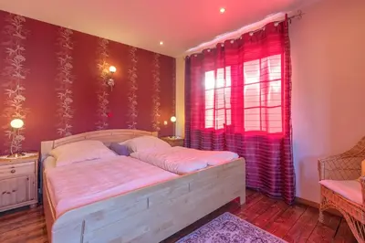 Ein Bett oder Betten in einem Zimmer der Unterkunft Ferienhaus Wichtelhus