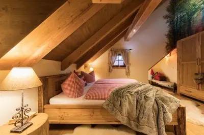 Ein Bett oder Betten in einem Zimmer der Unterkunft Chalets zum Ilsetal - Brocken-Chalet