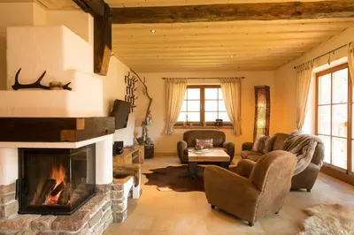 Ein Sitzbereich in der Unterkunft Chalets zum Ilsetal , Schloß-Chalet