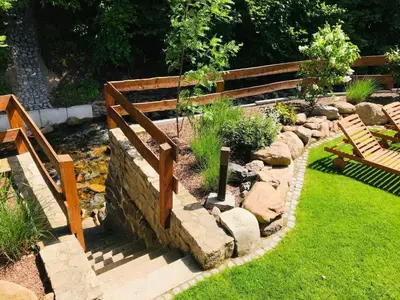 Ein Garten an der Unterkunft Chalets zum Ilsetal, Jagd-Chalet