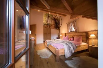 Ein Bett oder Betten in einem Zimmer der Unterkunft Chalets zum Ilsetal, Carl-Lambrecht-Chalet