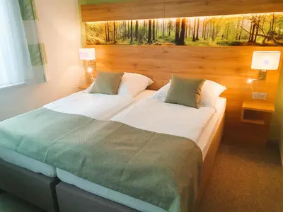 Ein Bett oder Betten in einem Zimmer der Unterkunft Haus Kuhlmann
