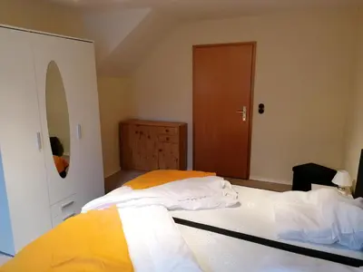 Ein Bett oder Betten in einem Zimmer der Unterkunft Ferienwohnungen Untermühle, Rothenbergerstr. 12