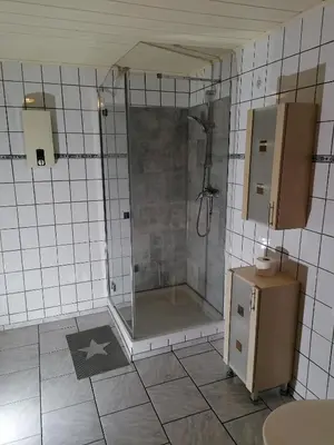 Ein Badezimmer in der Unterkunft Ferienwohnungen Untermühle, Rothenbergerstr. 12