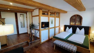 Ein Bett oder Betten in einem Zimmer der Unterkunft Traditions - Hotel 