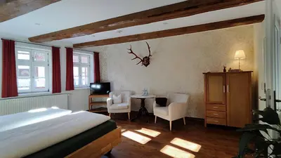 Ein Bett oder Betten in einem Zimmer der Unterkunft Traditions - Hotel 