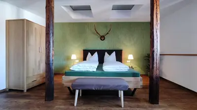 Ein Bett oder Betten in einem Zimmer der Unterkunft Traditions - Hotel 
