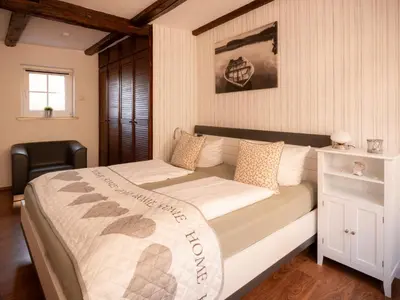 Ein Bett oder Betten in einem Zimmer der Unterkunft Ferienhaus Castle View Quedlinburg