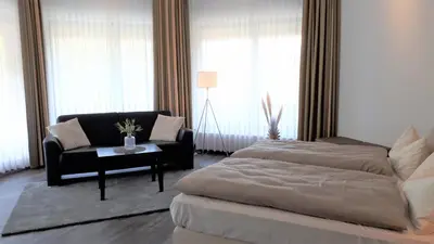 Ein Bett oder Betten in einem Zimmer der Unterkunft Hotel Habichtstein