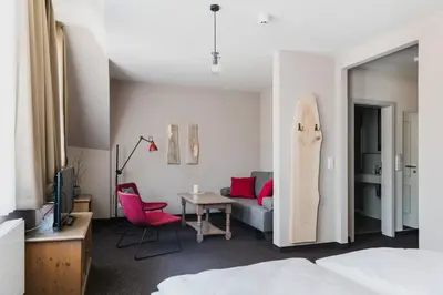 Ein Bett oder Betten in einem Zimmer der Unterkunft Hotel Villa Bodeblick