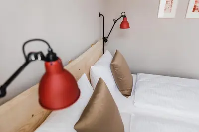 Ein Bett oder Betten in einem Zimmer der Unterkunft Hotel Villa Bodeblick
